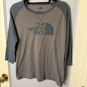 The North Face Women's Gray with Blue 3/4 sleeves. Standard Fit Shirt